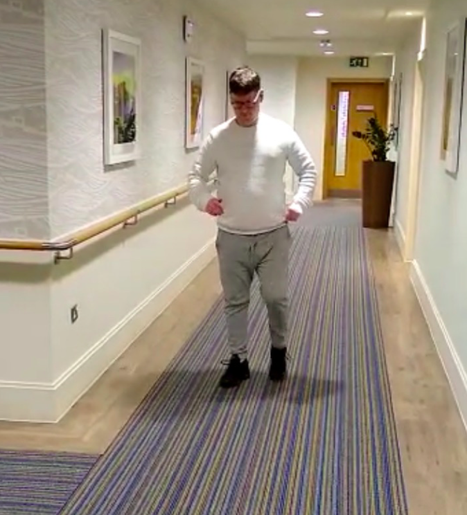Chris and Running - Running in the gym corridor